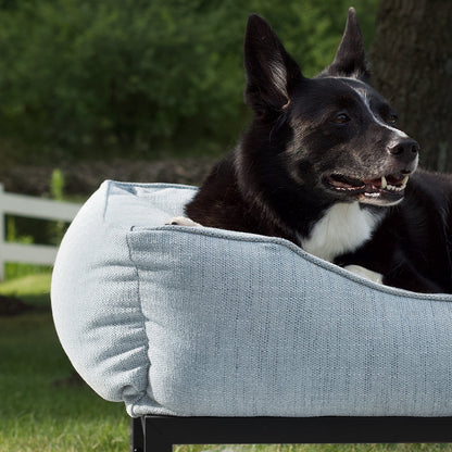 The FÜZI Elevated Dog Bed – Mist Blue Performance Fabric on Black Metal Base (S/M/L/XL)