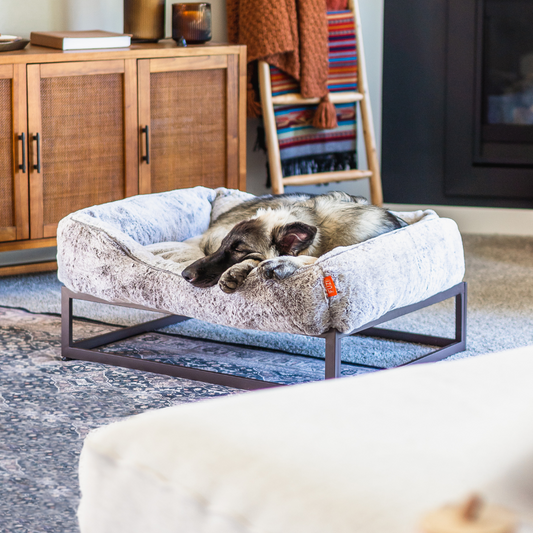 FÜZI Elevated Dog Bed with Bolster – Chew-Resistant Raised Metal Frame & Plush Faux-Fur Top