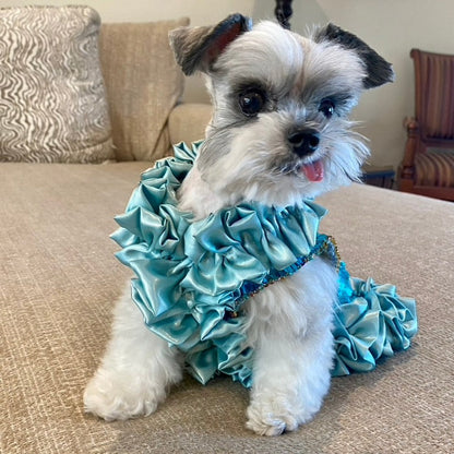 C’Mimi Designer Couture Shimmering Blue Dog Party Dress – Handmade aqua satin and sequin couture dress with rhinestone details, designed by Jan Ben. One-of-a-kind and made to order (6–8 weeks). Sizes XS–3XL, custom sizes available.