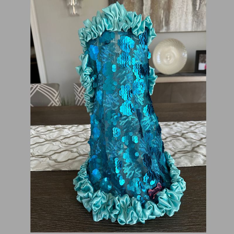 C’Mimi Designer Couture Shimmering Blue Dog Party Dress – Handmade aqua satin and sequin couture dress with rhinestone details, designed by Jan Ben. One-of-a-kind and made to order (6–8 weeks). Sizes XS–3XL, custom sizes available.