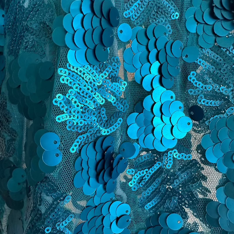 C’Mimi Designer Couture Shimmering Blue Dog Party Dress – Handmade aqua satin and sequin couture dress with rhinestone details, designed by Jan Ben. One-of-a-kind and made to order (6–8 weeks). Sizes XS–3XL, custom sizes available.