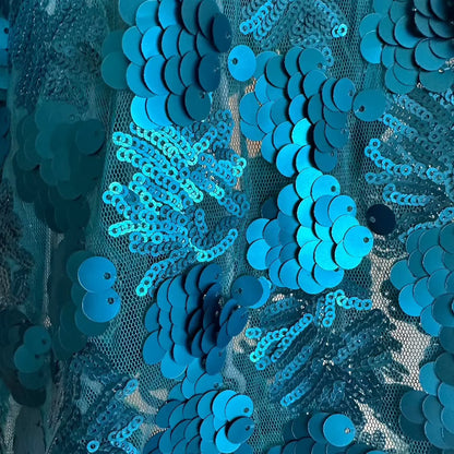 C’Mimi Designer Couture Shimmering Blue Dog Party Dress – Handmade aqua satin and sequin couture dress with rhinestone details, designed by Jan Ben. One-of-a-kind and made to order (6–8 weeks). Sizes XS–3XL, custom sizes available.