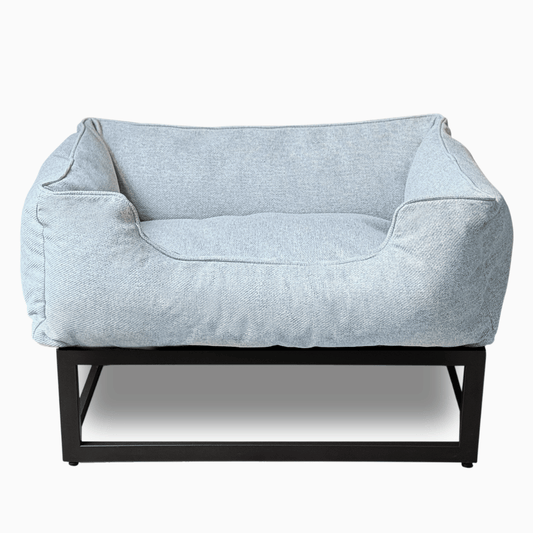 The FÜZI Raised Dog Bed – Sky Blue Performance Fabric with Black Metal Base